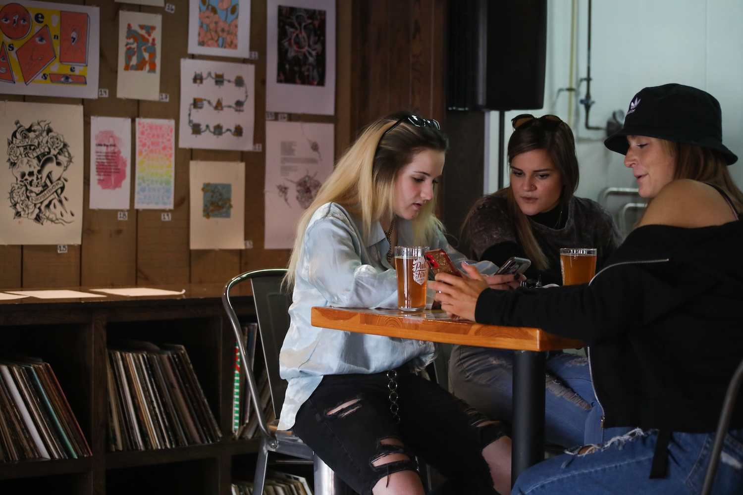 Friends at table drinking beer