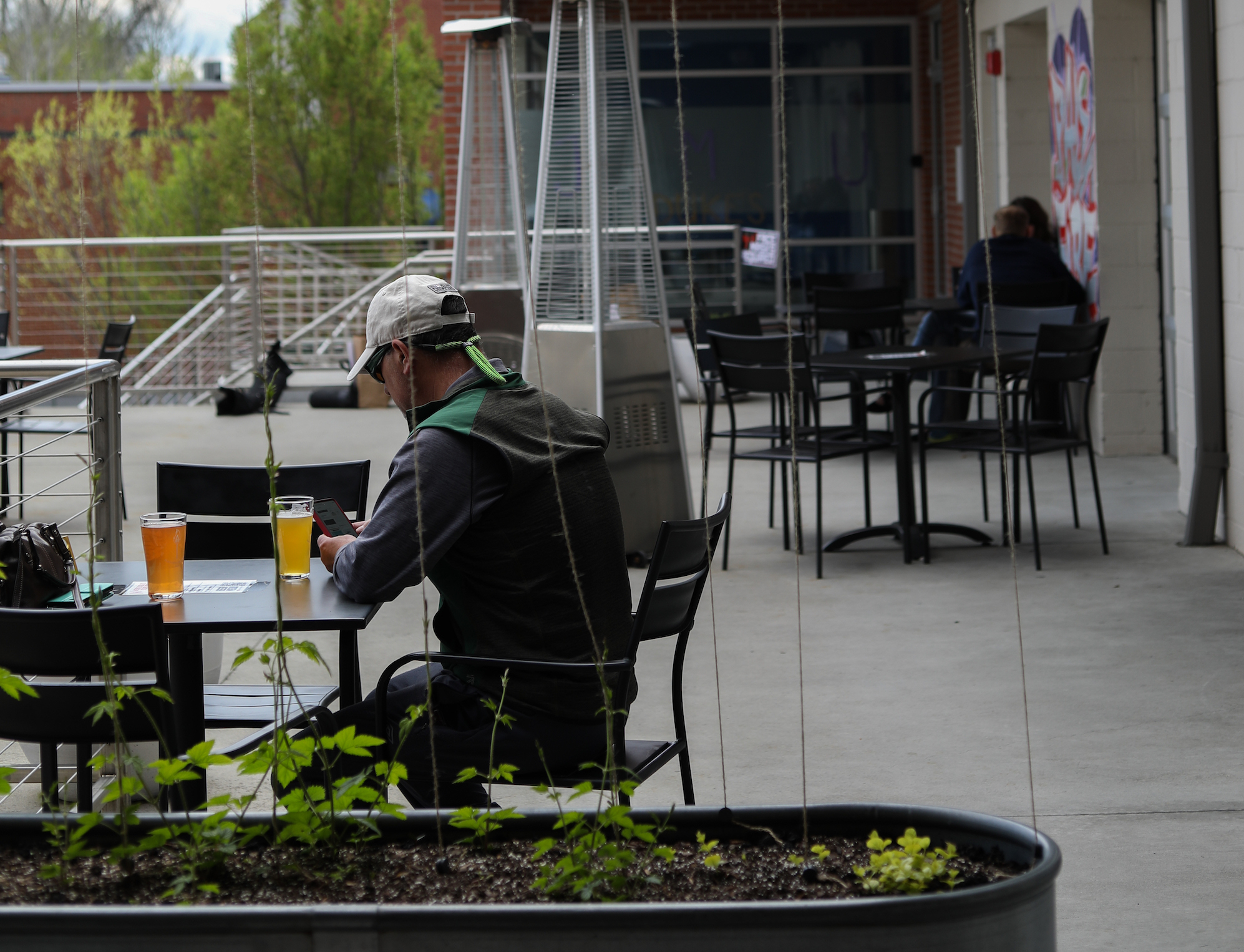 Man in hat enjoying beer