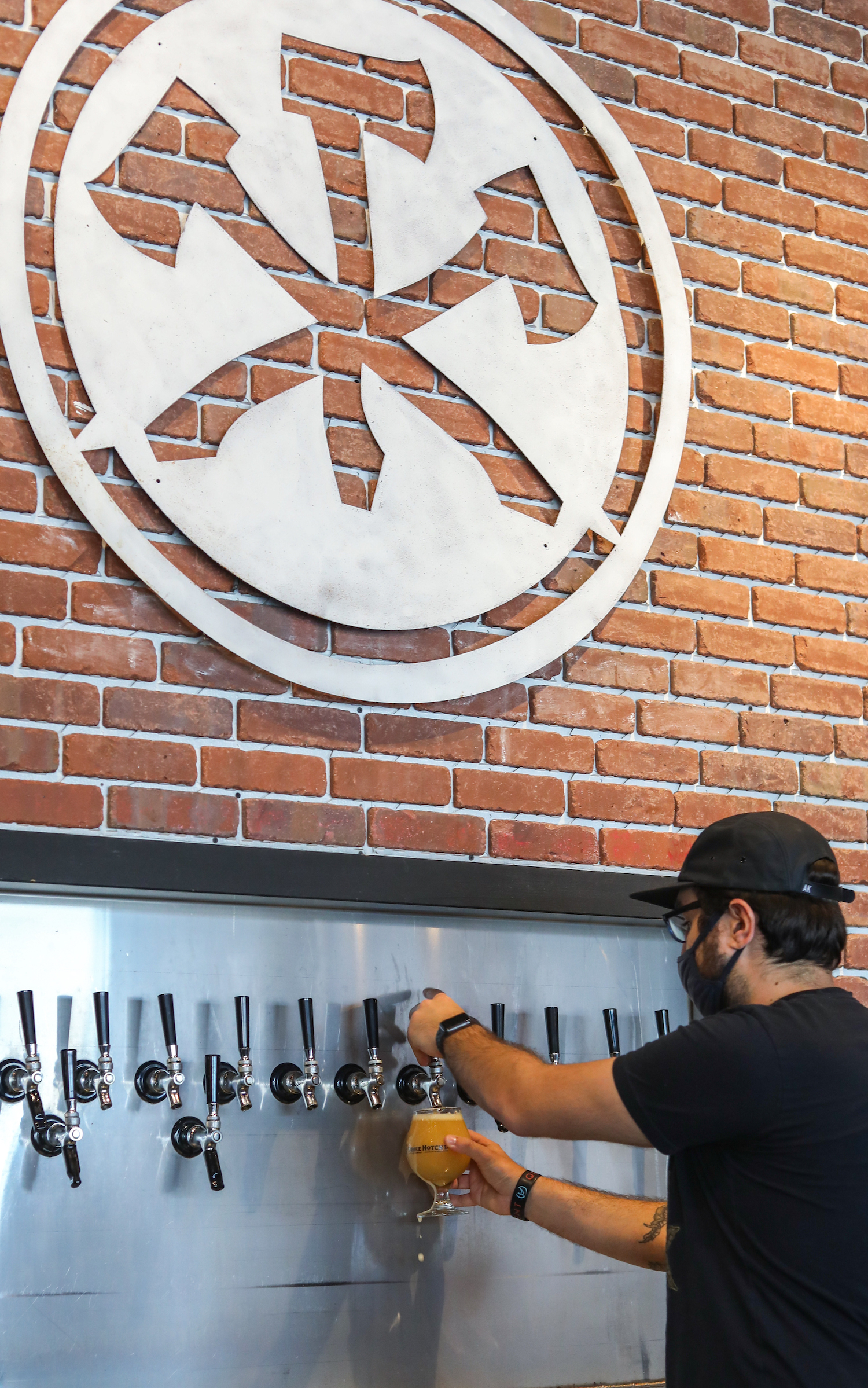 Bartender pulling a beer